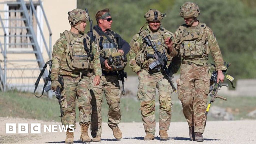 US to cut troop levels in Germany by 5,000 amid Trump spat with Merz - BBC